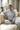 Athletic Heather hoodie with matching joggers, relaxed on a couch