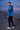 Back-angle promenade editorial with black joggers