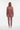 Back studio view of the female model wearing the matching rose set