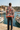 Back view of the hoodie at a Mediterranean marina
