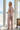 Back view of the matching short-sleeved floral pajama set
