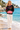 Barefoot beach look with cream linen trousers