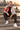 Bearded model seated on harbor steps