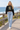Black hoodie, boardwalk