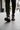 Black jeans sidewalk