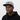 Black man in gray snapback