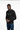 Black model in black crew looking down