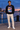 Black Surfxion sweatshirt at a harbor