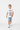 Boy age 6 walking pose casual