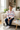 Boy wearing the white hoodie at home