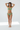Brunette model with beachy waves playful pose
