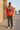 Burnt orange sweatshirt architectural editorial