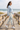 Camo leggings and pale-blue hoodie at the beach