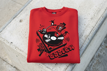 Cardinal sweatshirt artwork and neckline on concrete