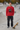 Cardinal with distressed black baggy jeans