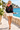 Coastal back-view look with cream shorts