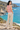 Coastal back-view look with sand trousers