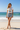 Crop Tee — Denim Shorts, Beach Stand
