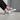 Crossed feet detail