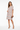 Dress with statement earrings and elegant heels
