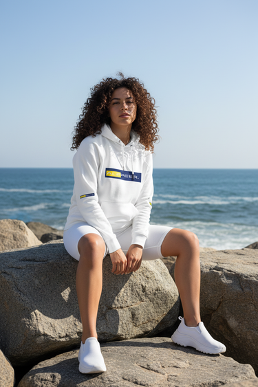 Female 3 — white biker shorts, beach rocks