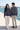 Female and male waterfront sweatshirt editorial