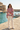 Female hoodie editorial with ivory linen pants