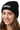 Female model close-up wearing black beanie