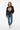 Female model in black sweatshirt with denim jeans