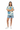Female model in denim shorts and white sneakers