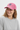 Female model - pink cap candid styling
