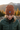 Female model - rust beanie with outerwear