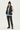 Female model - winter look with puffer vest and beanie, matching cardigan