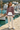 Female model with ivory linen pants