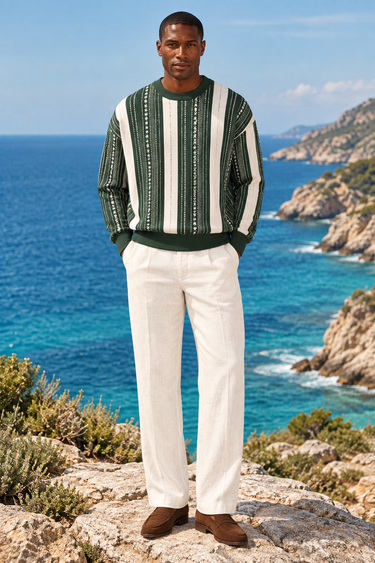 Front-facing coastal look with the same model in the forest-green and cream sweater