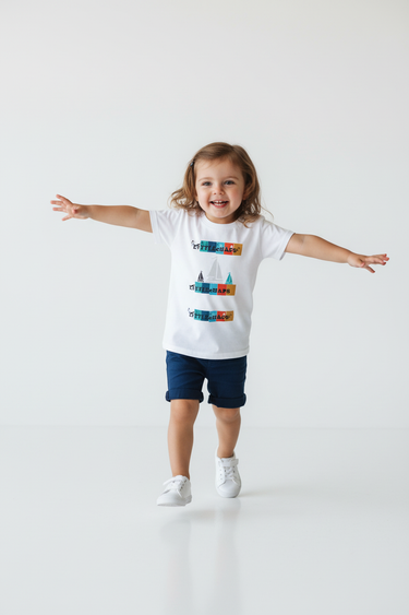 Girl age 3 arms outstretched playful