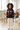 Girl wearing the hoodie in a classroom