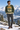 Green ski sweater at an alpine overlook