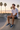 Grey boardshorts white tee skate park