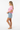 Hazy pink crop top side profile view