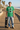 Heather kelly ODDSON tee on a coastal boardwalk