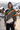 Hood-up editorial in a snowy ski resort village