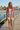 Hoodie styled with a white tank and tailored shorts