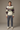 Hoodie styled with joggers in a studio