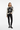 Artistic palm sweater with black jeans for modern casual aesthetic