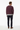 Back view of sweater with navy trousers in professional setting