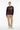 Abstract burst sweater with beige corduroy pants for relaxed casual style