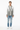 Abstract paint splash cardigan styled casually with light wash denim and white sneakers