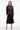 Abstract burst sweater with pleated midi skirt for feminine polished look