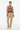 Abstract art sweater with beige corduroy pants for relaxed casual style